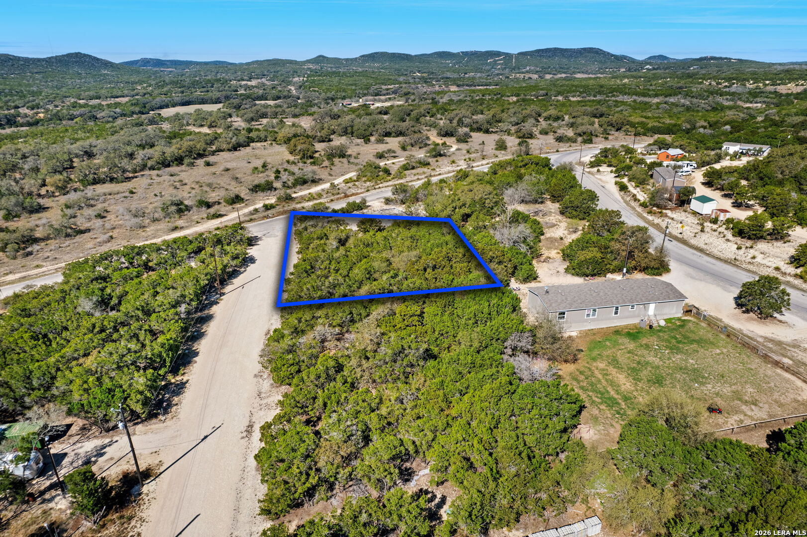 Tbd Bandera Lakeshore Bandera, TX 78003 - Photo 5 of 8 an aerial view of residential houses with outdoor space and trees