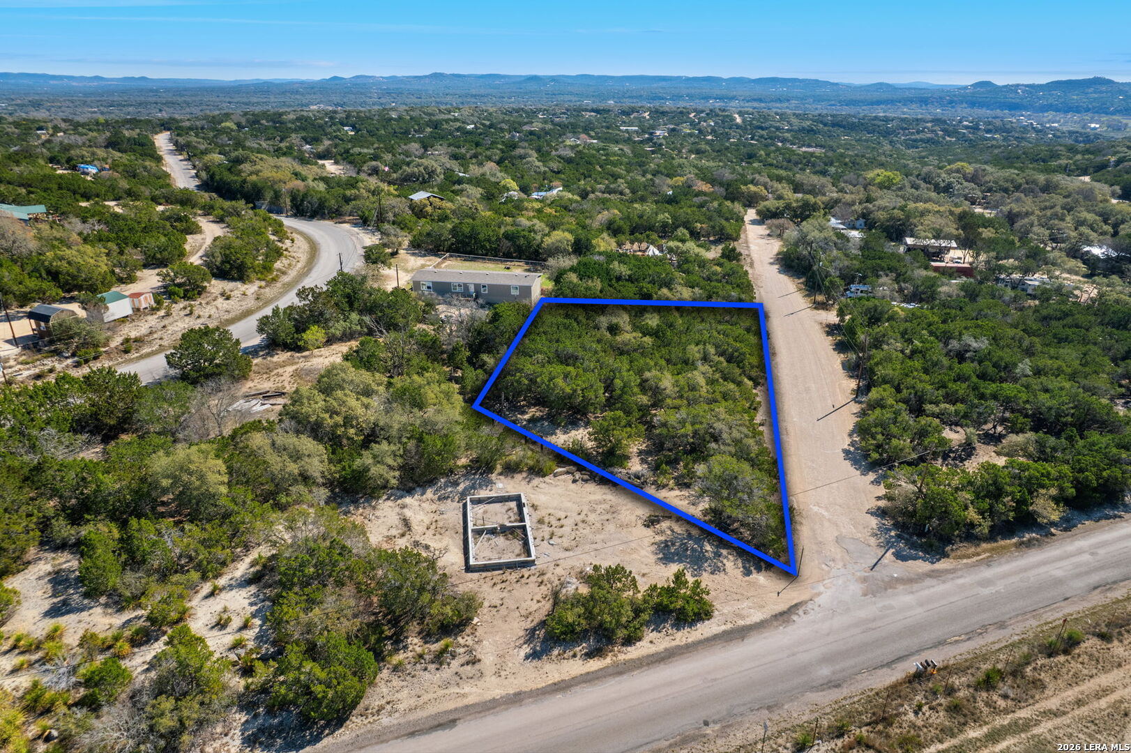 Tbd Bandera Lakeshore Bandera, TX 78003 - Photo 7 of 8 an aerial view of a house