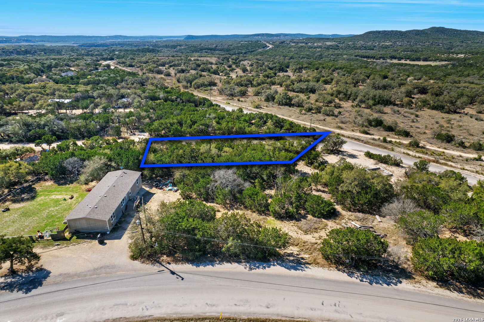 Tbd Bandera Lakeshore Bandera, TX 78003 - Photo 8 of 8 an aerial view of multiple house