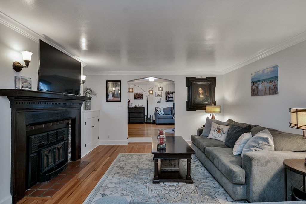 39 Carter Road Westminster, MA 01473 - Photo 8 of 42 a living room with furniture a flat screen tv and a fireplace