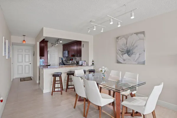 a view of a dining room with furniture
