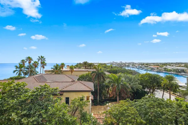 a aerial view of a house with a yard