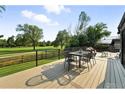 a view of a chairs and table on the terrace