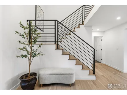 a view of entryway with wooden floor