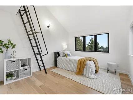 a bathroom with a double vanity sink mirror and shower