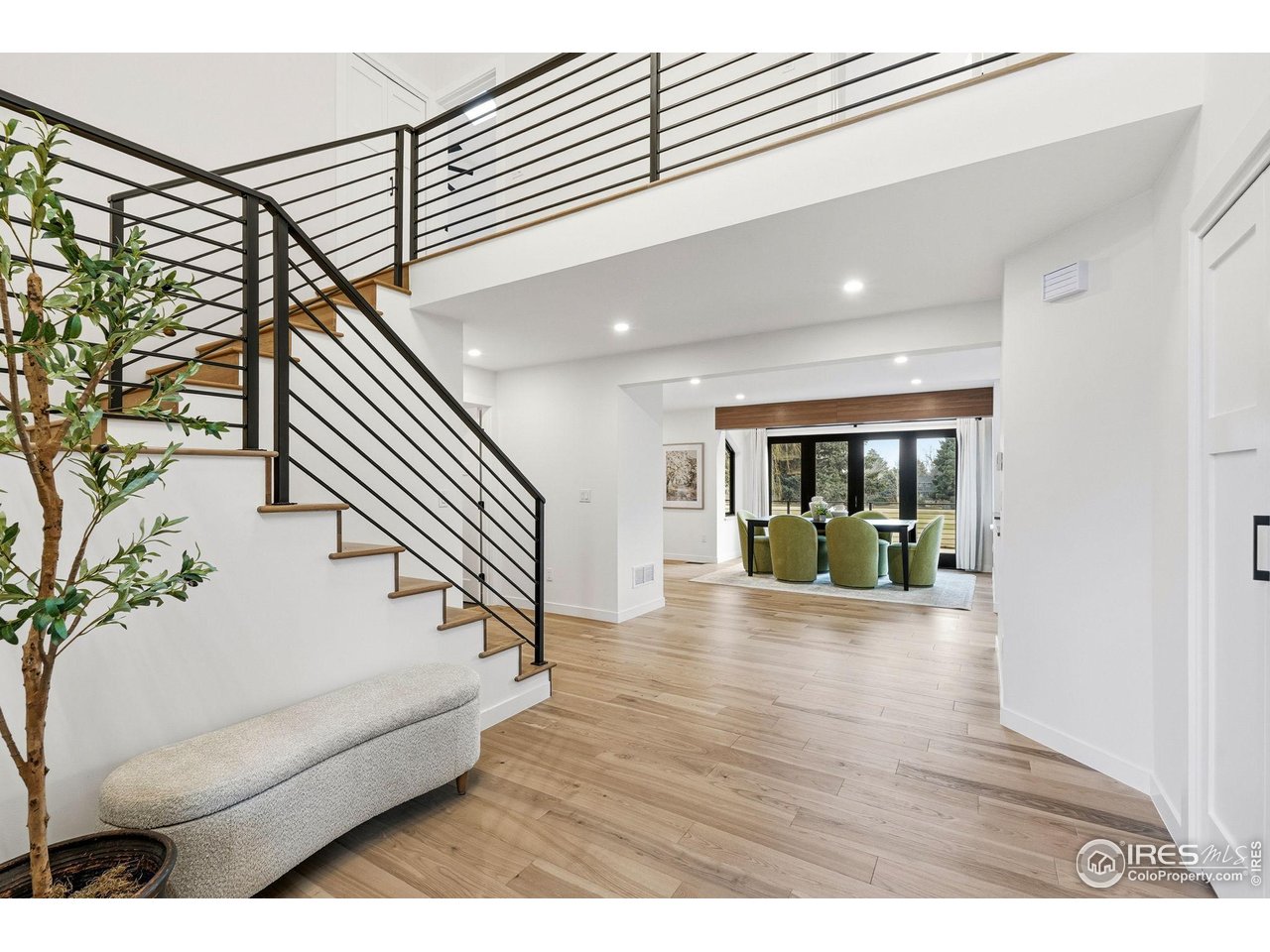 7312 Island Circle Boulder, CO 80301 - Photo 4 of 50 a view of entryway and hall with wooden floor