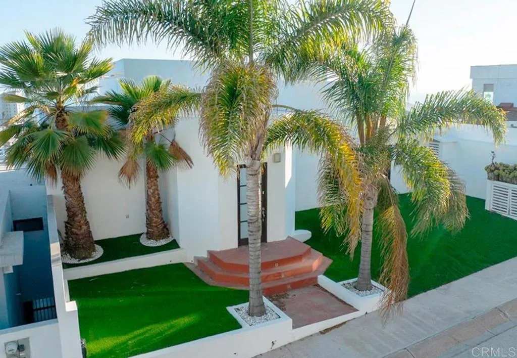 167 Marina San Diego Real De San Marino Ensenada Mex San Diego, CA 92101 - Photo 3 of 21 a view of a backyard with a plants and palm trees