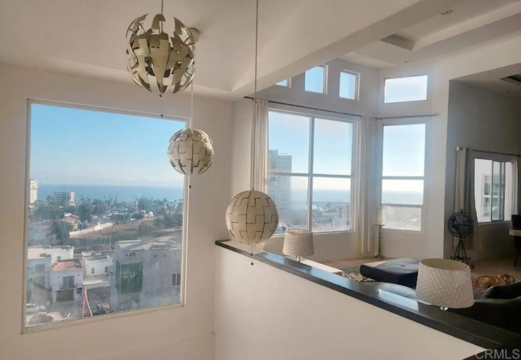 167 Marina San Diego Real De San Marino Ensenada Mex San Diego, CA 92101 - Photo 6 of 21 a front view of a chandelier and large windows