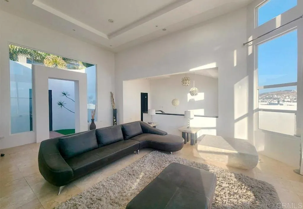 167 Marina San Diego Real De San Marino Ensenada Mex San Diego, CA 92101 - Photo 7 of 21 a living room with furniture and a couch