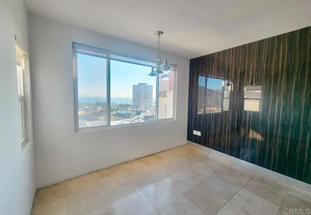 167 Marina San Diego Real De San Marino Ensenada Mex San Diego, CA 92101 - Photo 9 of 21 a view of an empty room with a window