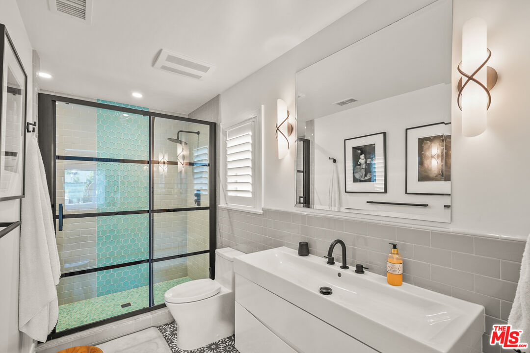 1240 Appleton Way Venice, CA 90291 - Photo 33 of 71 a bathroom with a sink toilet and shower