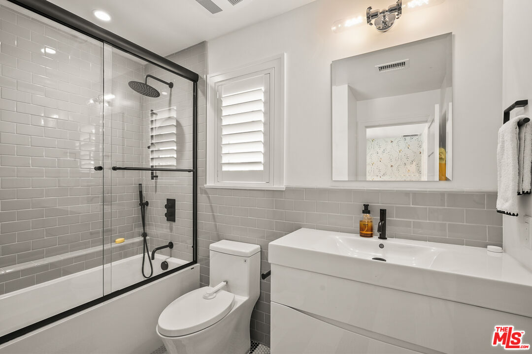 1240 Appleton Way Venice, CA 90291 - Photo 35 of 71 a bathroom with a sink toilet and shower