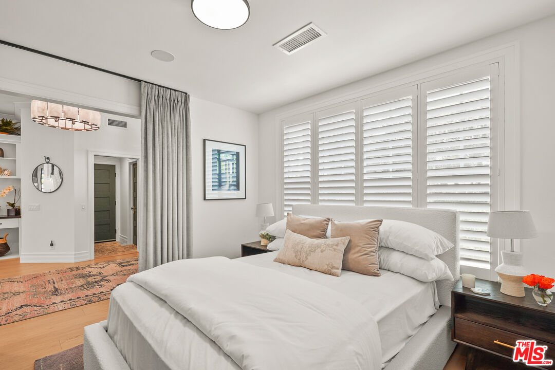 1240 Appleton Way Venice, CA 90291 - Photo 37 of 71 a bedroom with a bed and a window