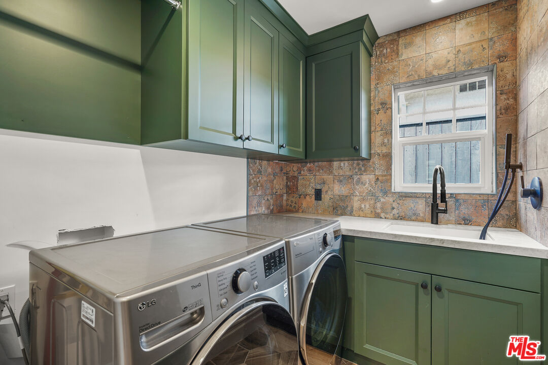 1240 Appleton Way Venice, CA 90291 - Photo 41 of 71 a utility room with a sink washer and dryer