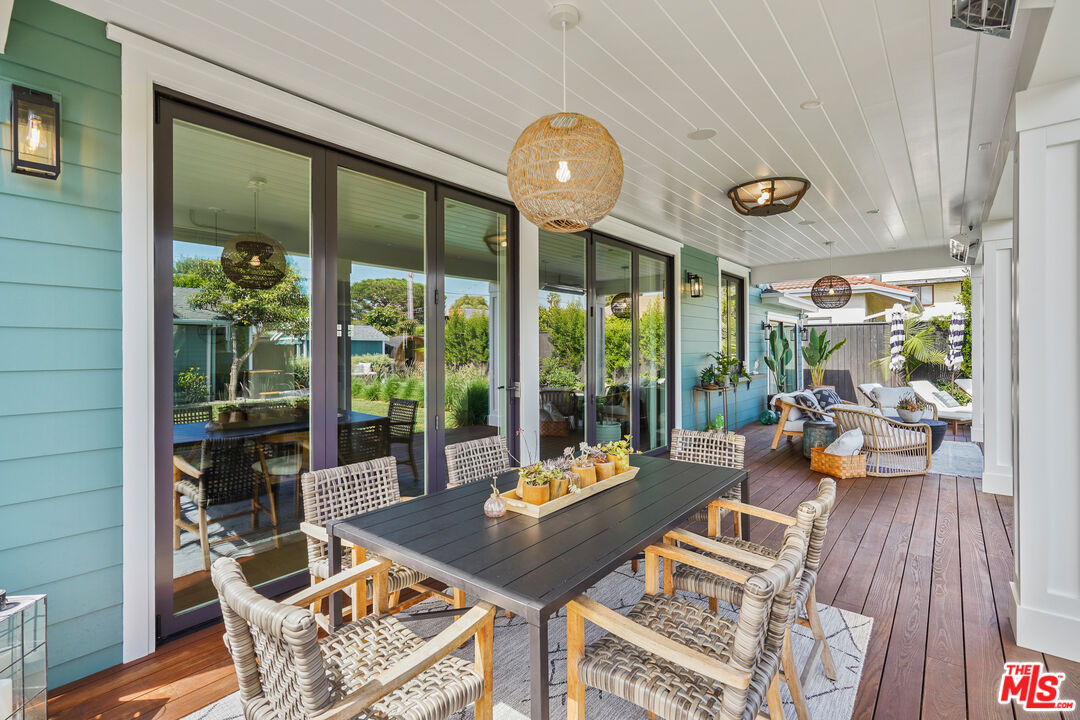 1240 Appleton Way Venice, CA 90291 - Photo 42 of 71 a living room with patio furniture and a large window