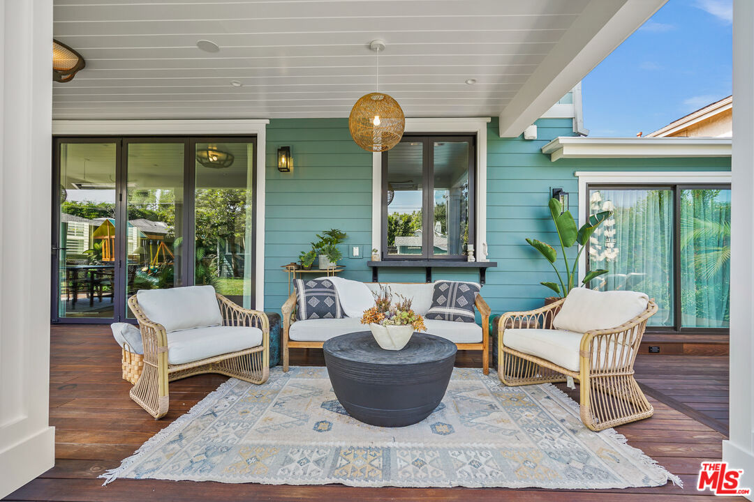 1240 Appleton Way Venice, CA 90291 - Photo 49 of 71 a living room with furniture and a large window