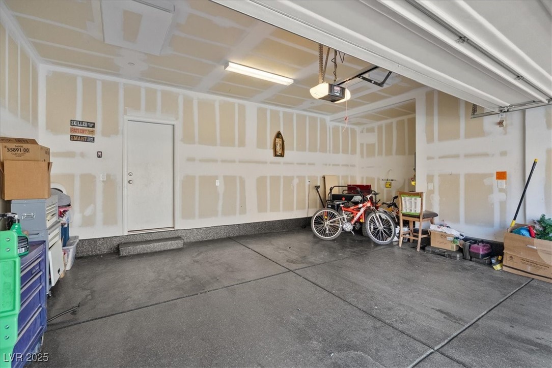 3732 Via Gennaro Henderson, NV 89044 - Photo 32 of 45 Epoxy garage floors with tons of extra storage space that doesn't take up part of your two car garage.
