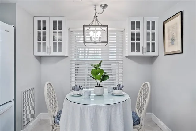 a view of swimming pool with outdoor seating