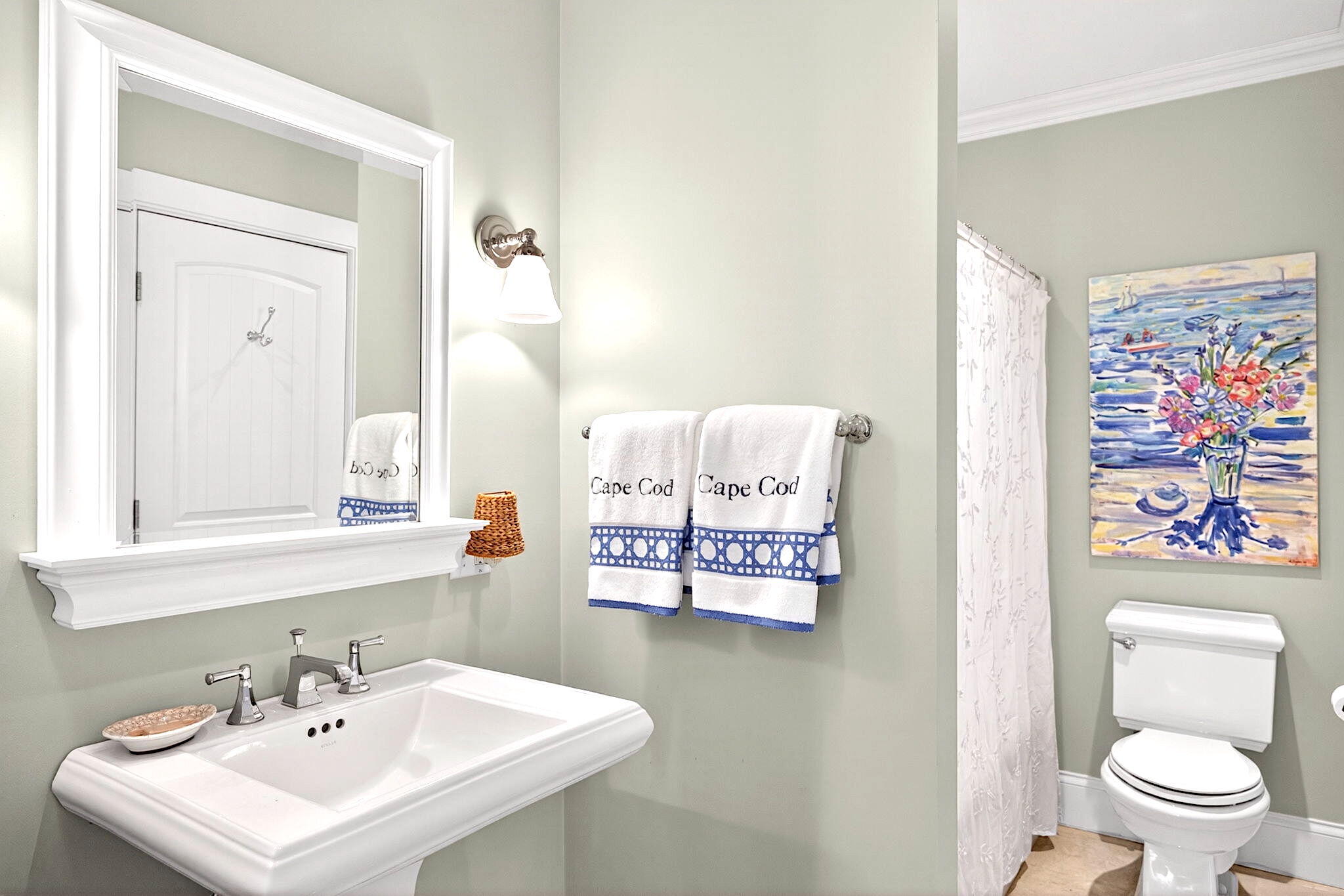 205 Little River Road Cotuit, MA 02635 - Photo 30 of 60 a bathroom with a sink a toilet and a mirror