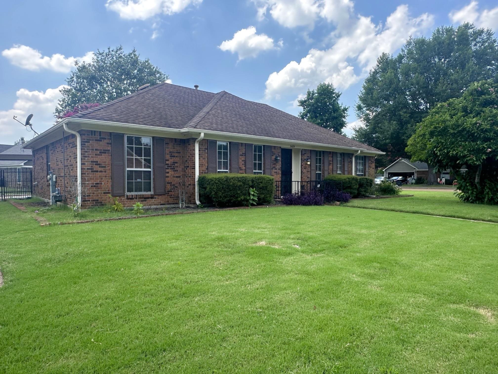 3489 Evening Light Drive Bartlett, TN 38135 - Photo 2 of 30 a front view of a house with garden