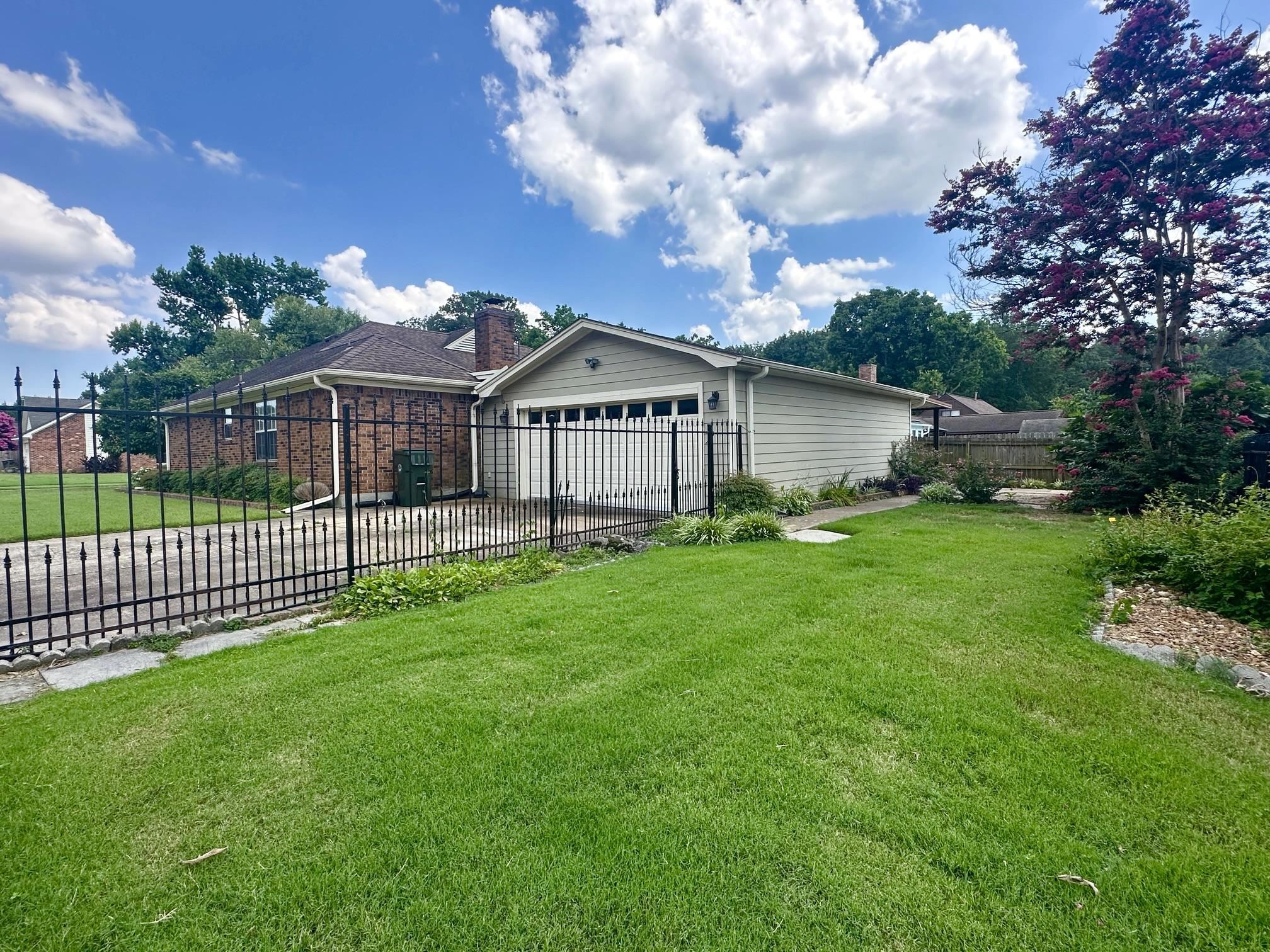 3489 Evening Light Drive Bartlett, TN 38135 - Photo 29 of 30 a front view of a house with garden