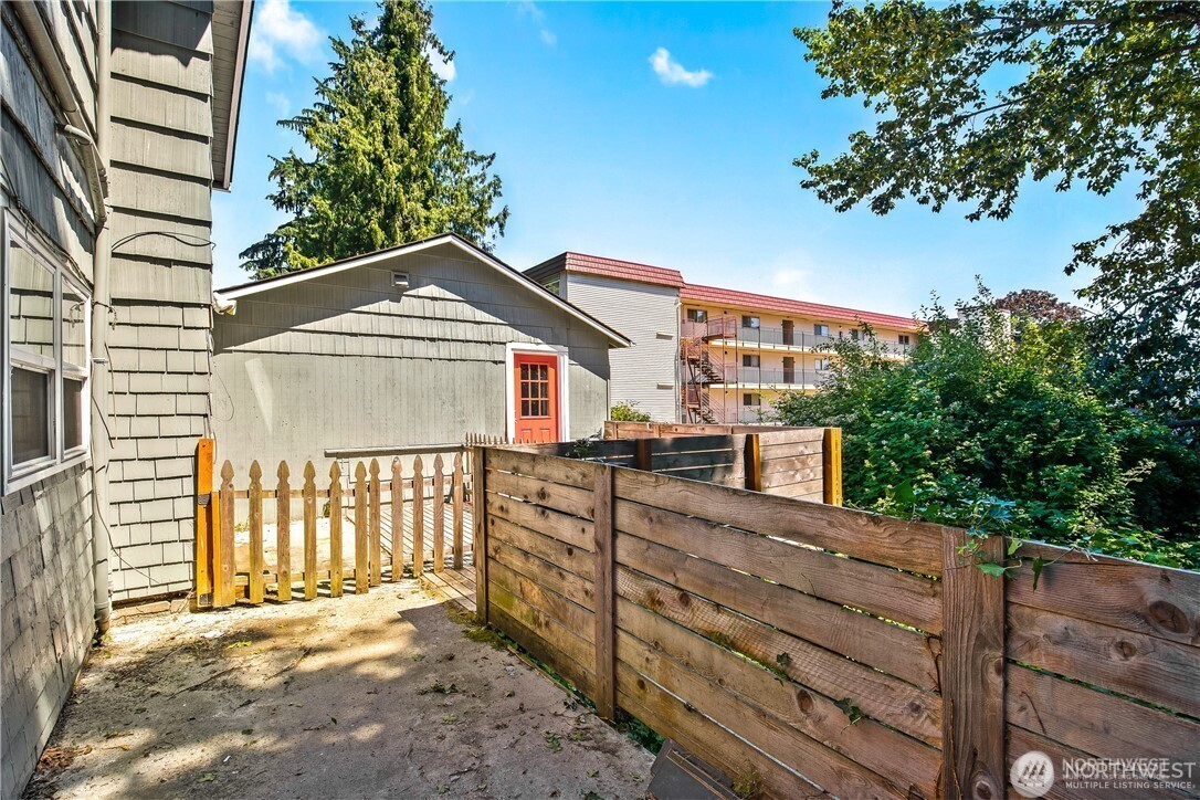 11806 Glendale Way South, Unit AB&C Seattle, WA 98168 - Photo 14 of 16 a view of a house with a yard