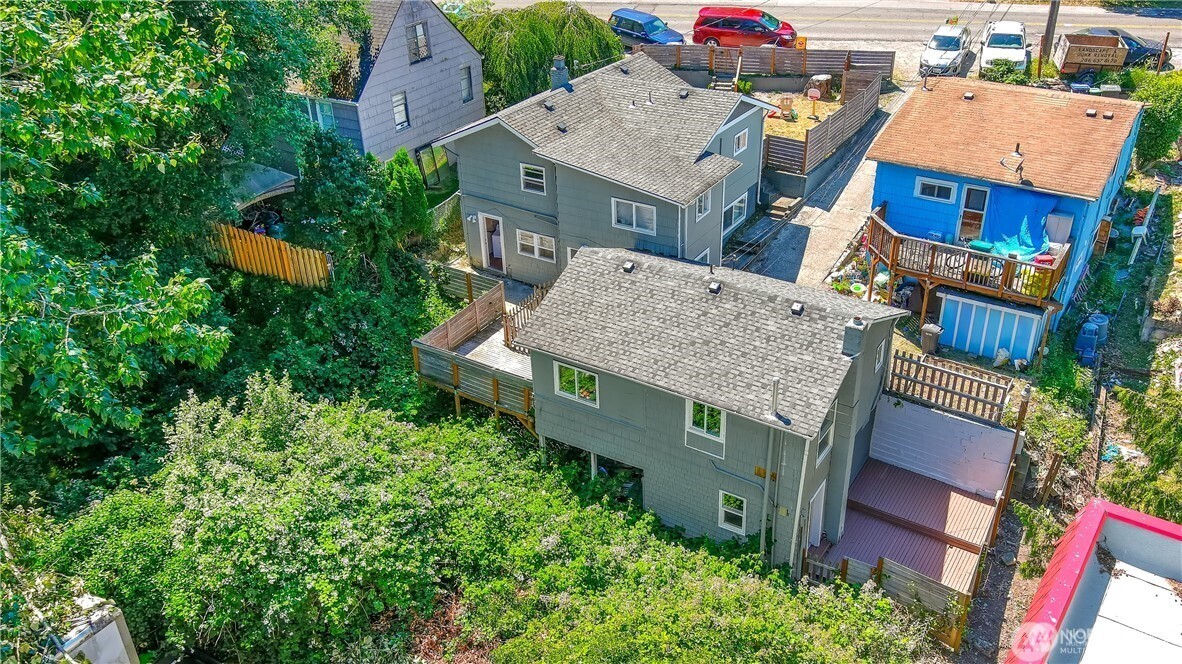 11806 Glendale Way South, Unit AB&C Seattle, WA 98168 - Photo 15 of 16 an aerial view of a house with a garden