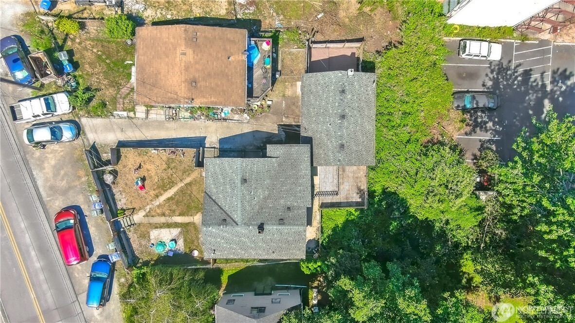 11806 Glendale Way South, Unit AB&C Seattle, WA 98168 - Photo 16 of 16 an aerial view of residential house with outdoor space and parking