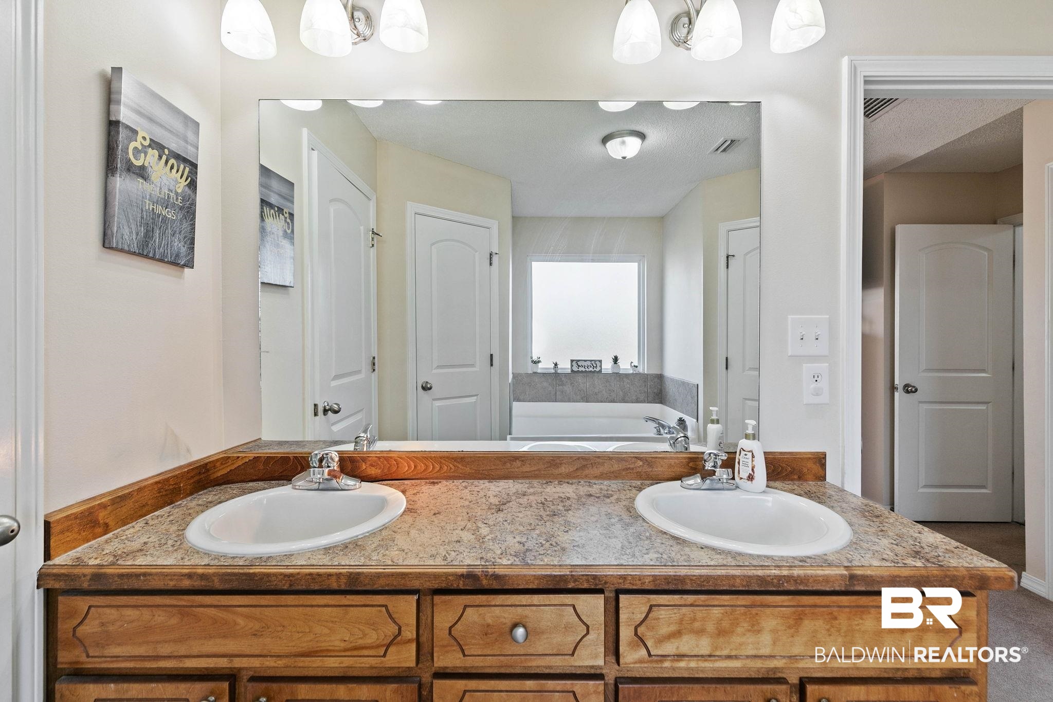 55750 Lottie Road Perdido, AL 36562 - Photo 52 of 84 Full bathroom with double vanity and a garden tub