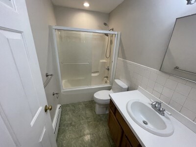 24 Pompeii Street, Unit 1 Boston, MA 02119 - Photo 9 of 10 a bathroom with a sink toilet and shower