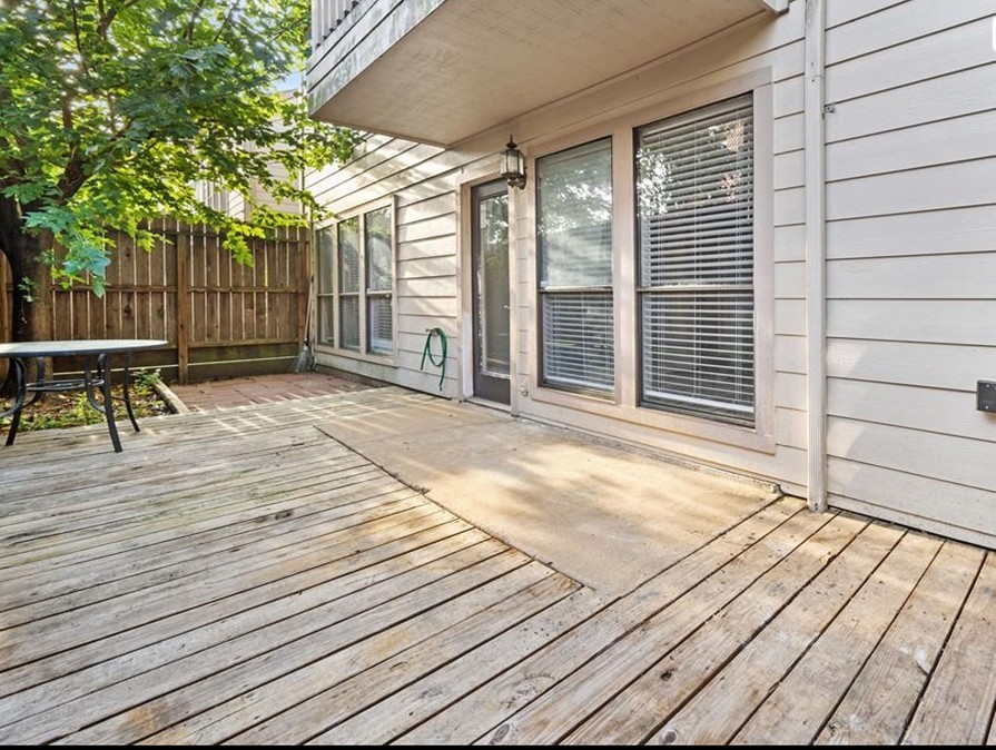 2277 South Kirkwood Road, Unit 1101 Houston, TX 77077 - Photo 13 of 18 a view of a deck with wooden floor and seating space
