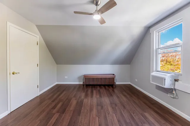 a view of workspace with wooden floor