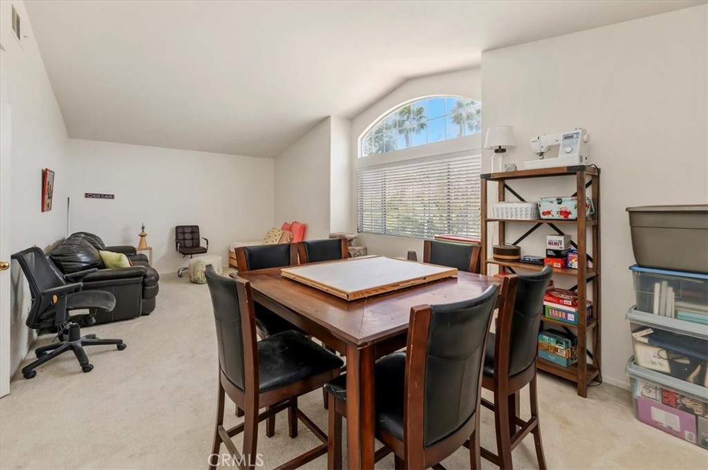 352 Leafwood Court Riverside, CA 92506 - Photo 36 of 42 a view of a workspace with furniture and a window