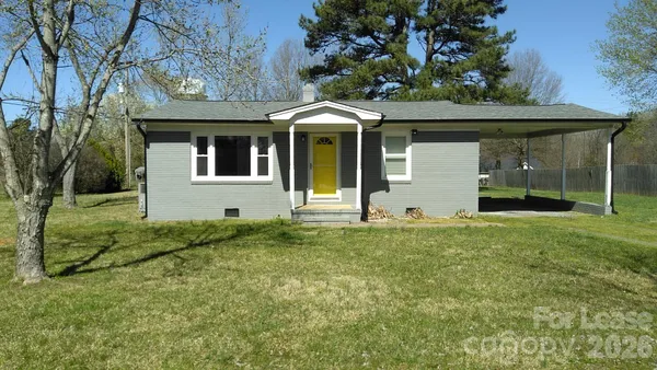 a front view of house with yard