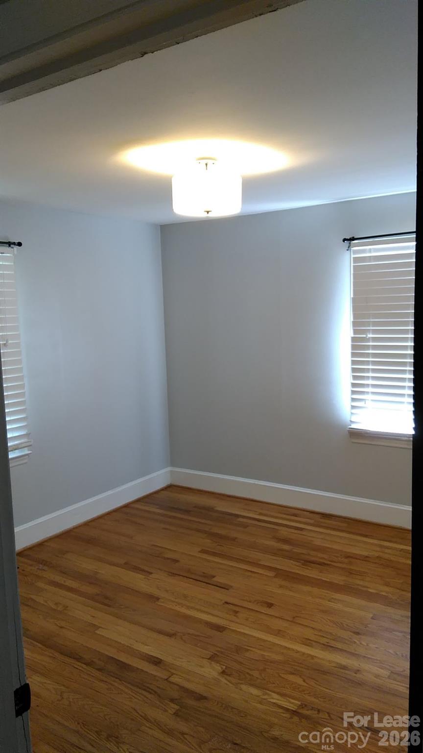 408 West Sandy Ridge Road Monroe, NC 28112 - Photo 5 of 11 a view of an empty room and window