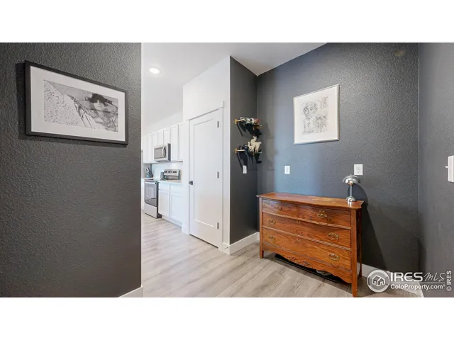 a room with furniture and wooden floor