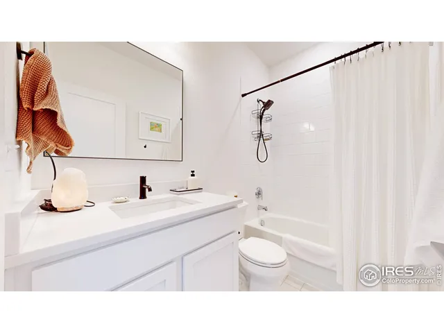 a bathroom with a sink a toilet and a bathtub