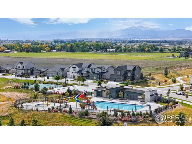 a view of swimming pool with outdoor seating