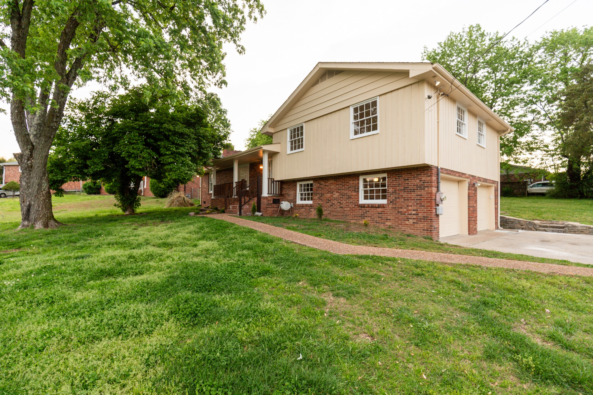 1240 Sioux Terrace Madison, TN 37115 - Photo 17 of 27 a view of a house with a yard