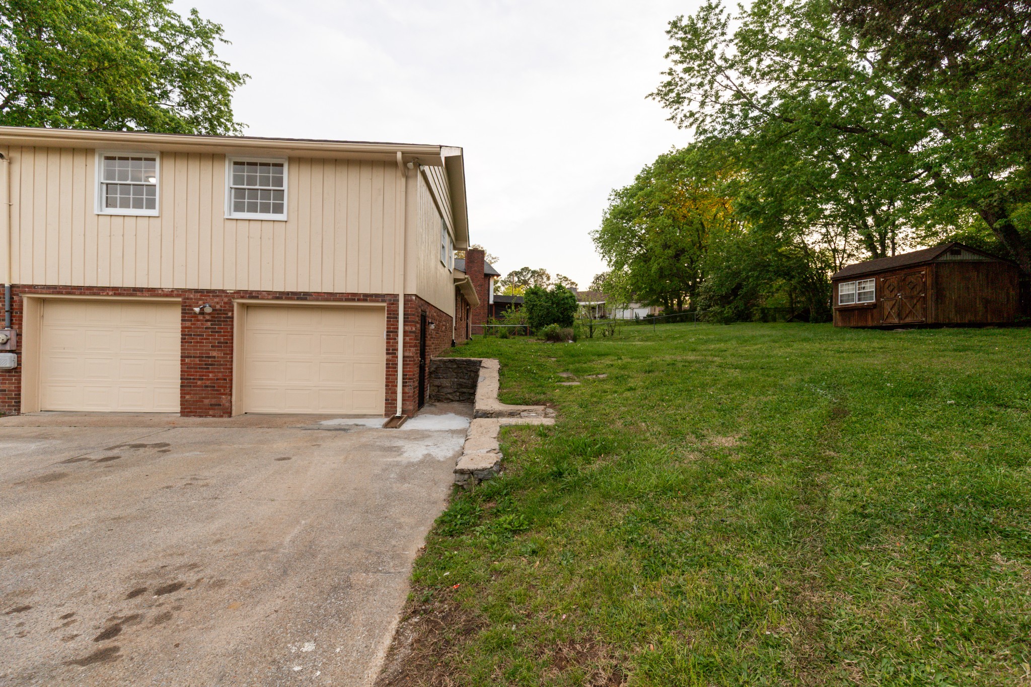 1240 Sioux Terrace Madison, TN 37115 - Photo 19 of 27 a view of a house with a backyard