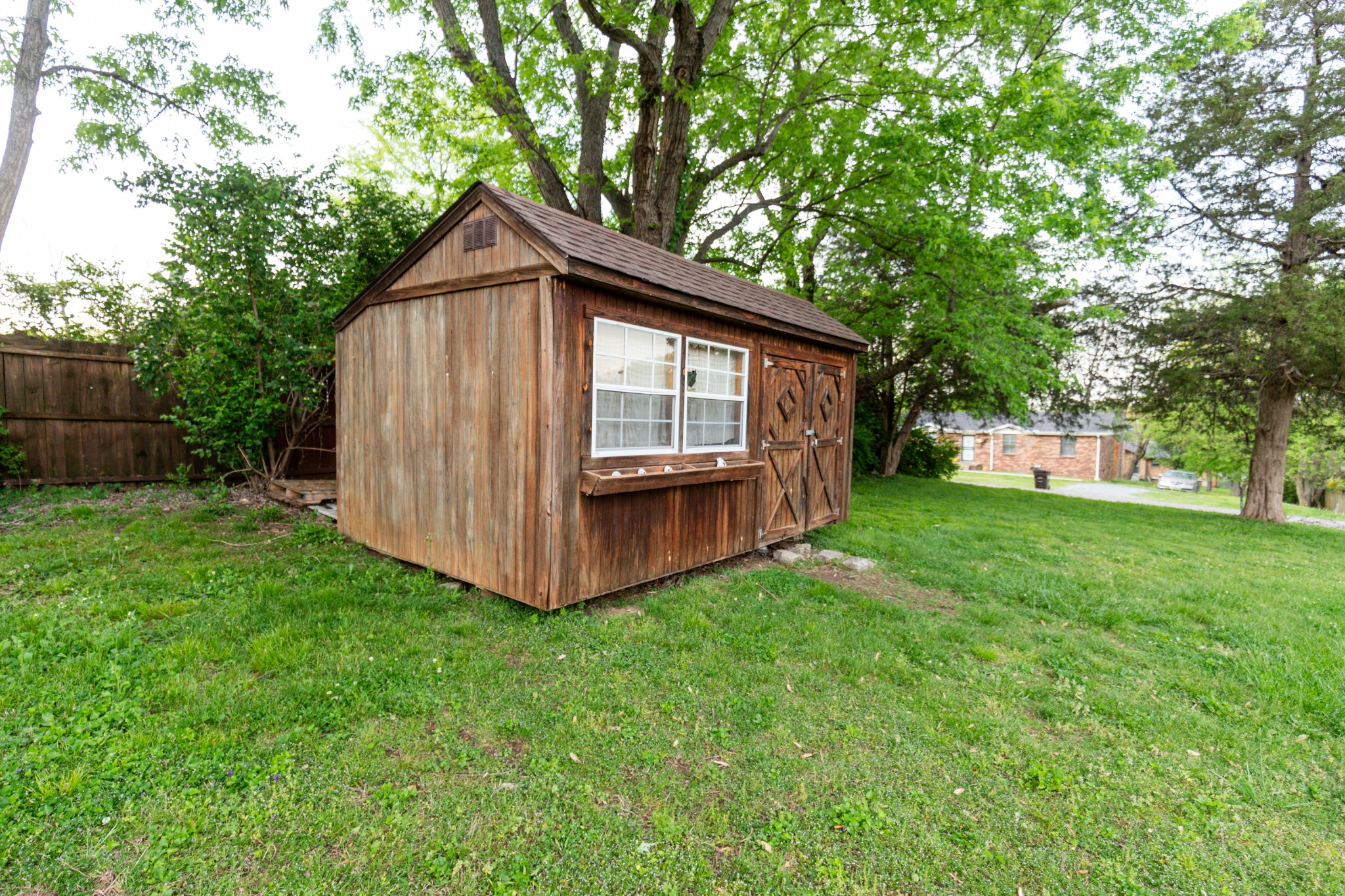 1240 Sioux Terrace Madison, TN 37115 - Photo 22 of 27 a view of a house with backyard and garden
