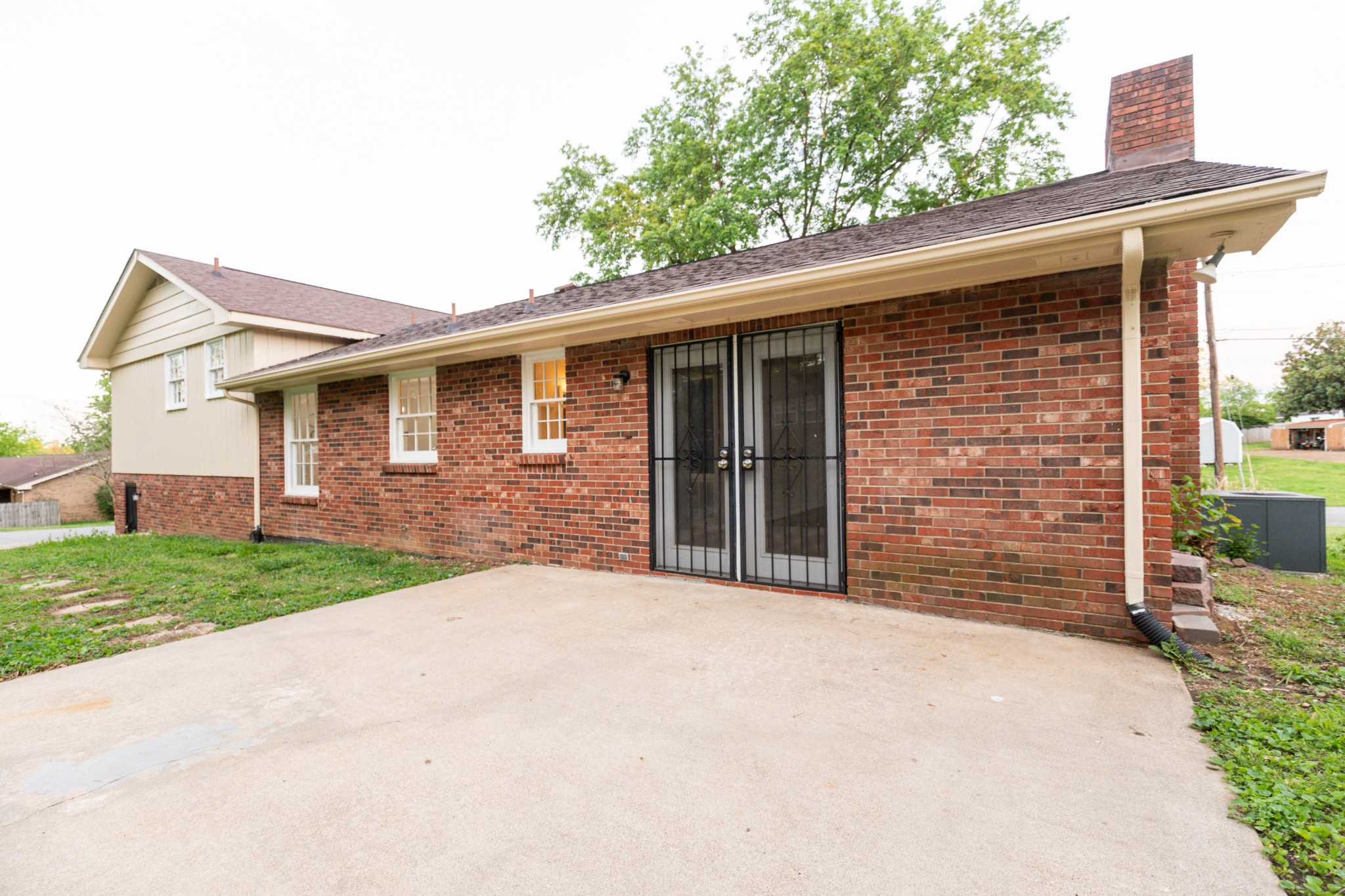 1240 Sioux Terrace Madison, TN 37115 - Photo 24 of 27 a front view of a house with a yard