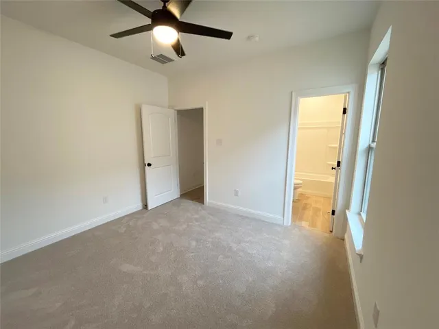 en view of an empty room with a window