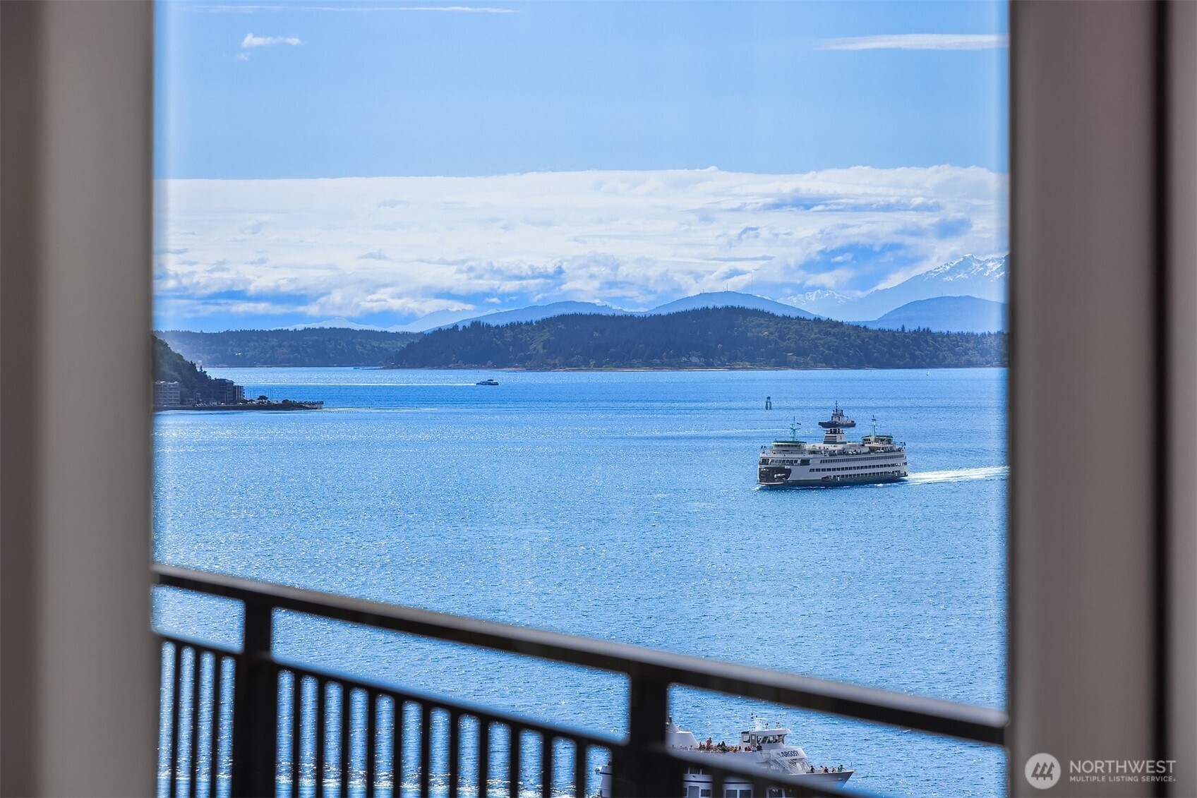 1009 Western Avenue, Unit 1203 Seattle, WA 98104 - Photo 22 of 30 a view of a room with an empty space and a mountain view