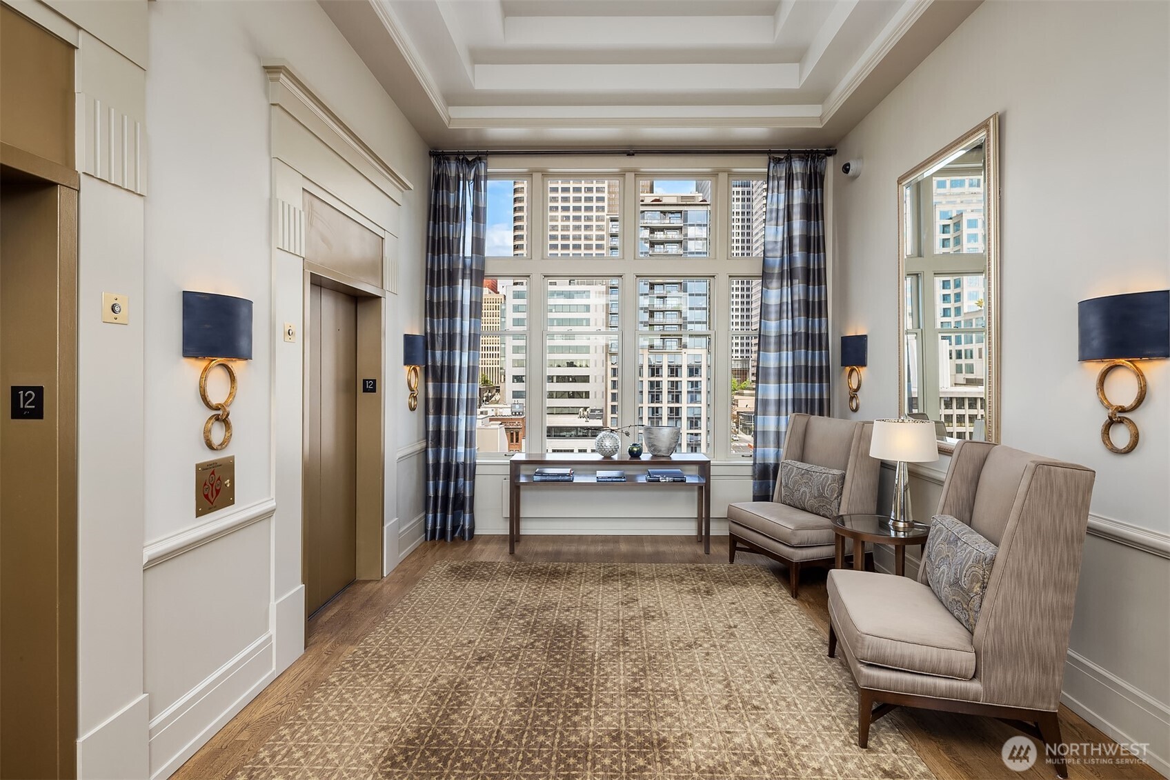 1009 Western Avenue, Unit 1203 Seattle, WA 98104 - Photo 26 of 30 a living room with furniture and a large window