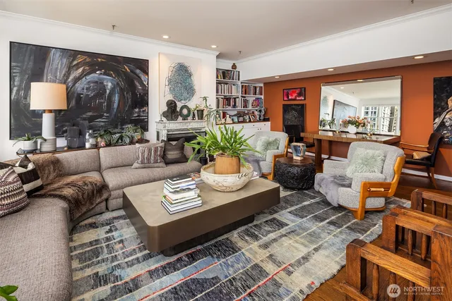 a spacious bathroom with a granite countertop sink a mirror and a shower