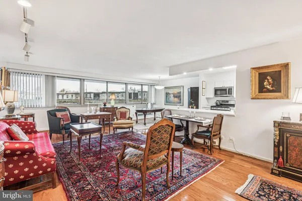 a living room with furniture and a table