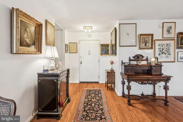 a bedroom with a bed and a chair