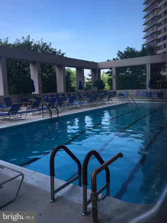 a view of a chairs and table in the patio