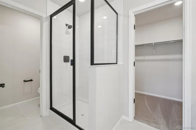 a view of a bathroom from a hallway